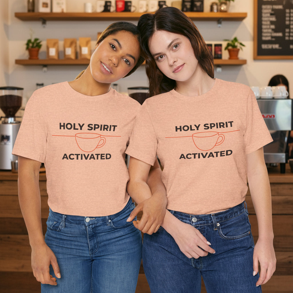 Two people wearing peach t-shirts with 'Holy Spirit Activated' text on a white background