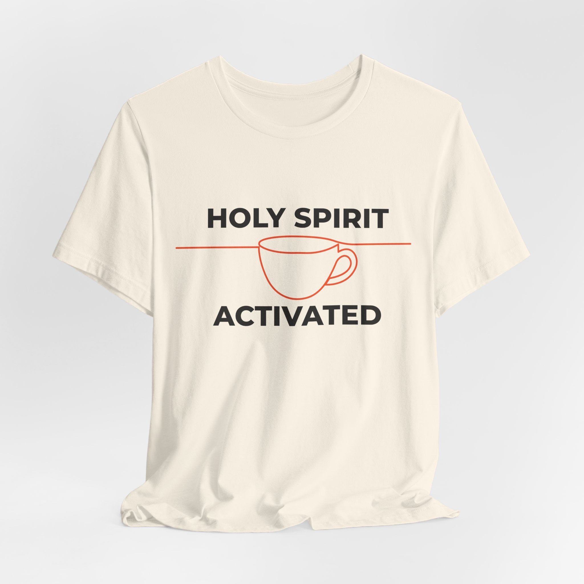 White t-shirt with 'Holy Spirit Activated' graphic on a light gray background