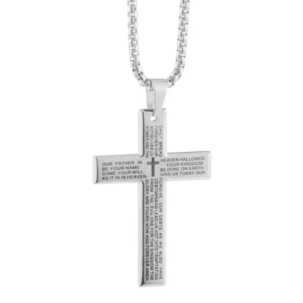 Silver cross pendant necklace with engraved text on a white background