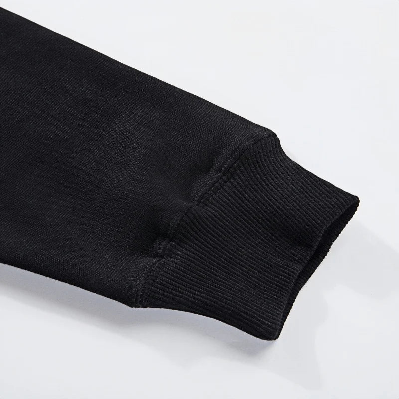 Close-up of a black sleeve on a white background