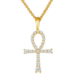 Gold cross pendant with diamonds on a white background