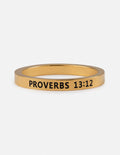 Gold ring with 'Proverbs 13:12' engraving on a white background