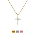 Gold cross necklace with diamond accents on a white background