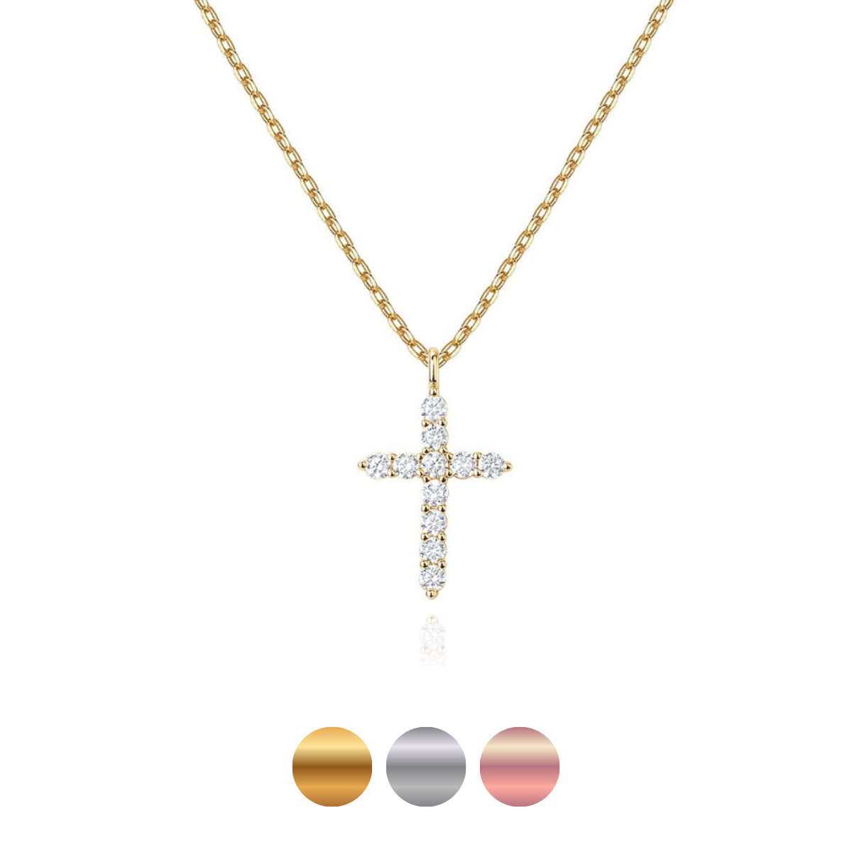 Gold cross necklace with diamond accents on a white background