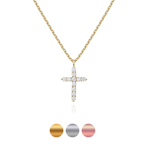Gold cross necklace with diamond accents on a white background