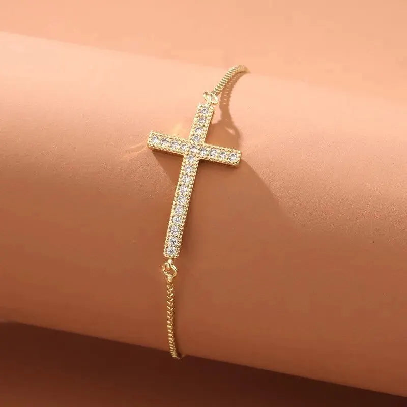 Zircon Cross Bracelet displayed elegantly on a surface.