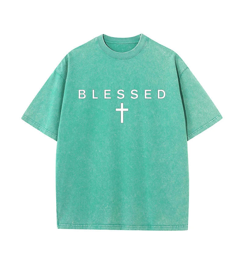 Green t-shirt with 'BLESSED' and a cross on a white background