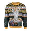 Sweater with religious design featuring a central figure and two angels on a patterned background.