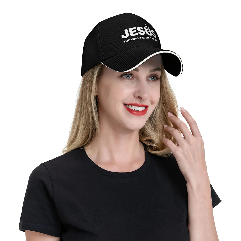 Woman wearing a black cap with 'Jesus The Way - Truth - The Life' text on a white background
