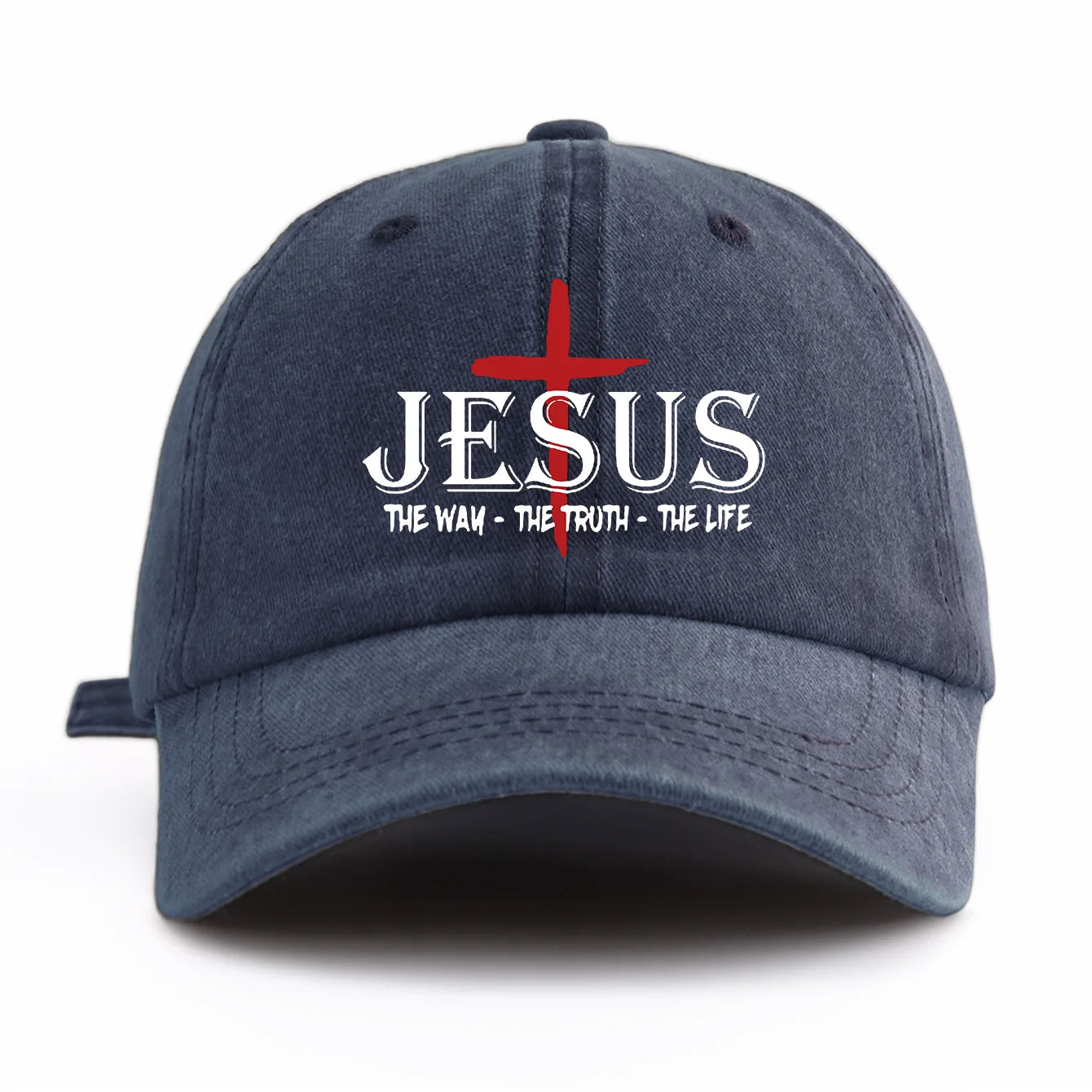 Navy blue cap with 'Jesus The Way The Truth The Life' text and cross design on a white background