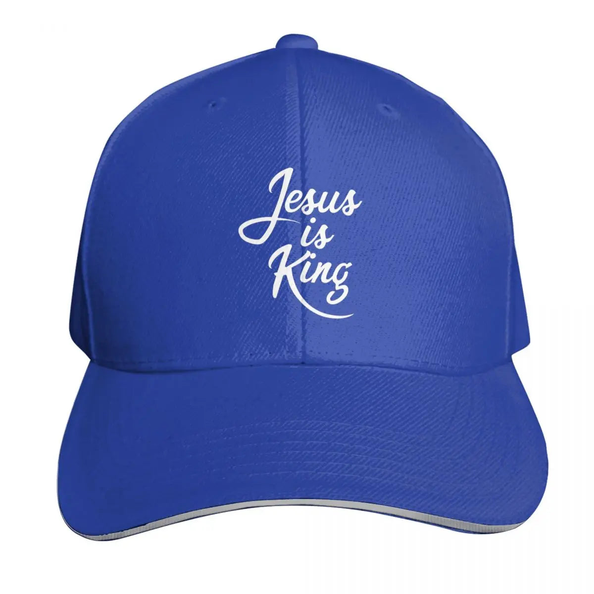 Blue cap with 'Jesus is King' text on a white background