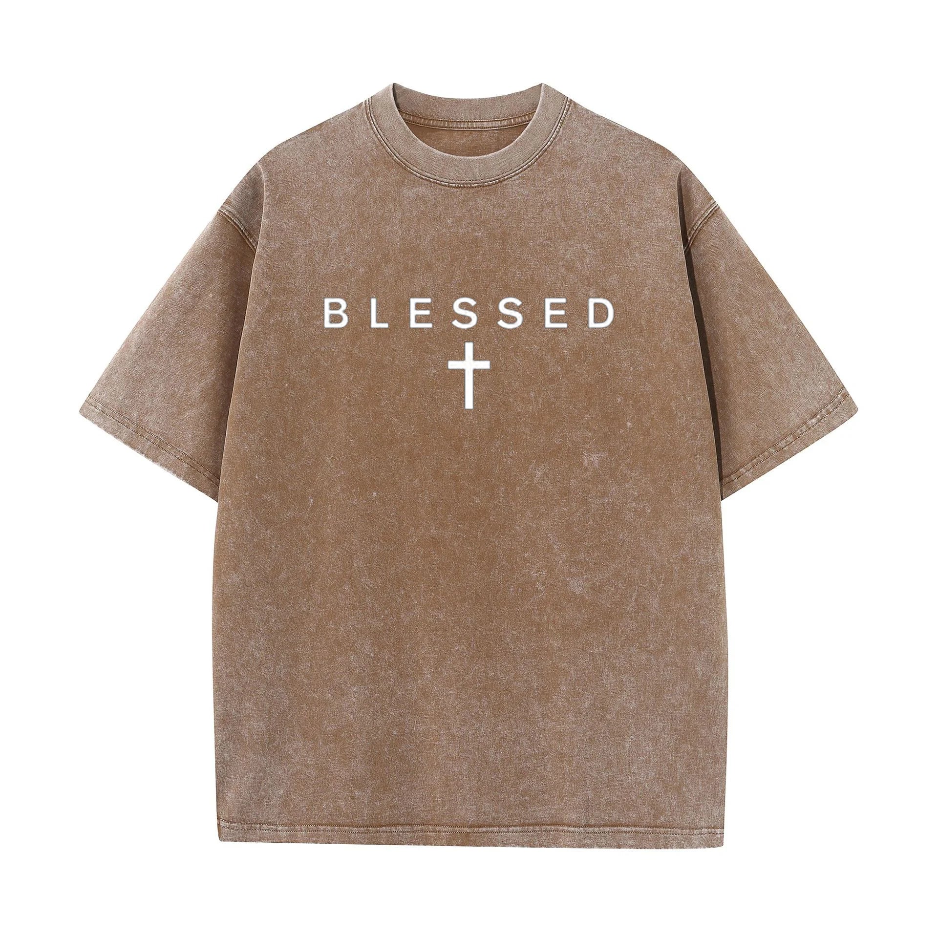Brown t-shirt with 'BLESSED' and a cross on a white background