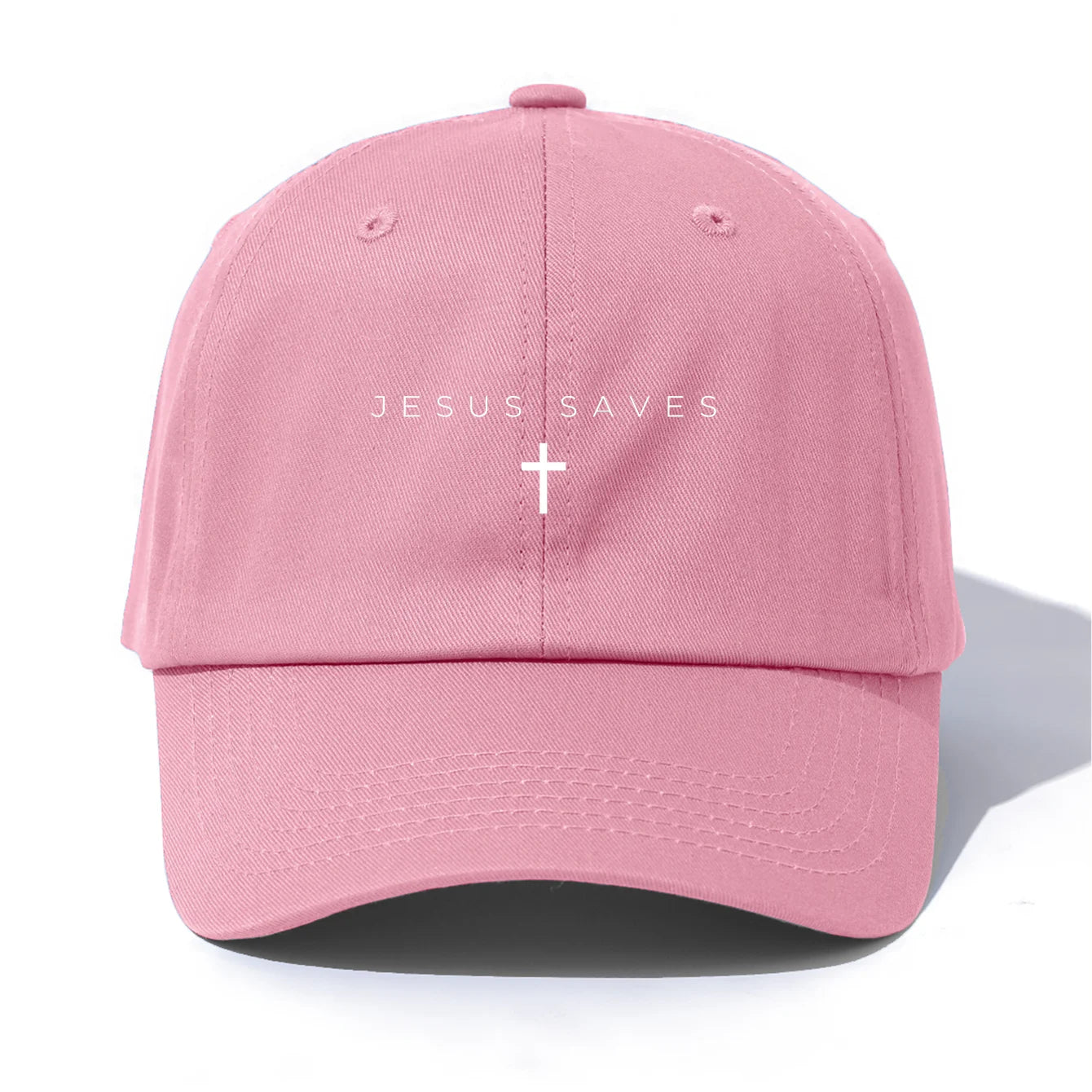 Pink cap with 'Jesus Saves' text with a cross on a white background