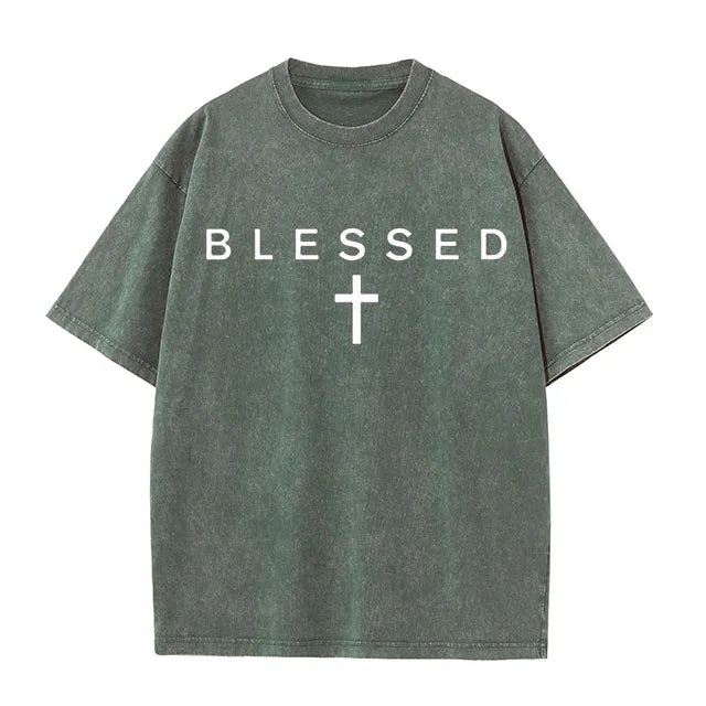 Green t-shirt with 'BLESSED' and a cross on a white background