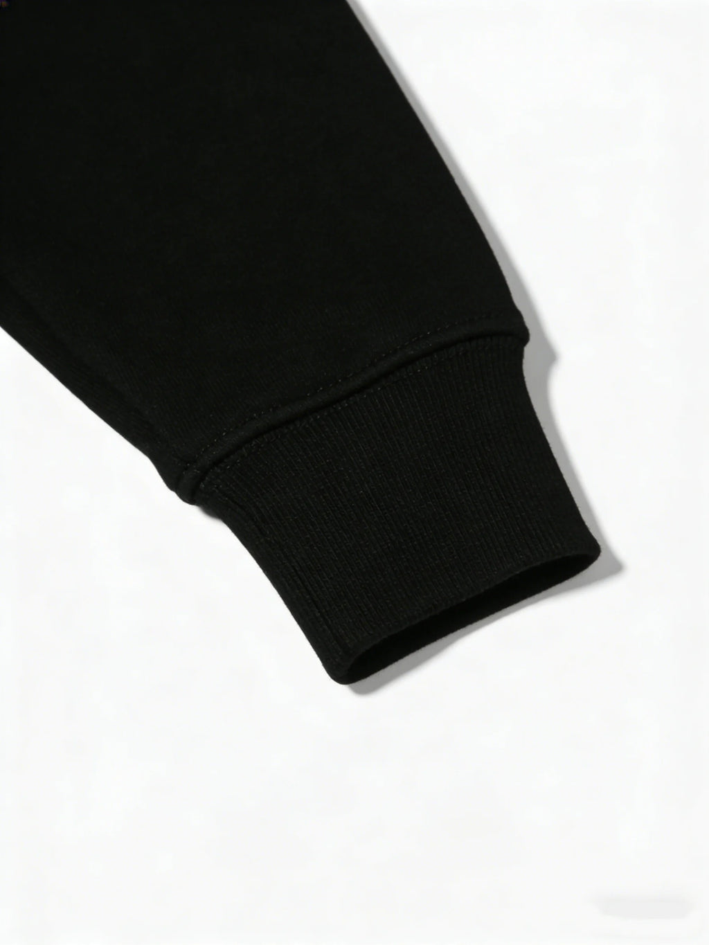 Close-up of a black sleeve on a white background