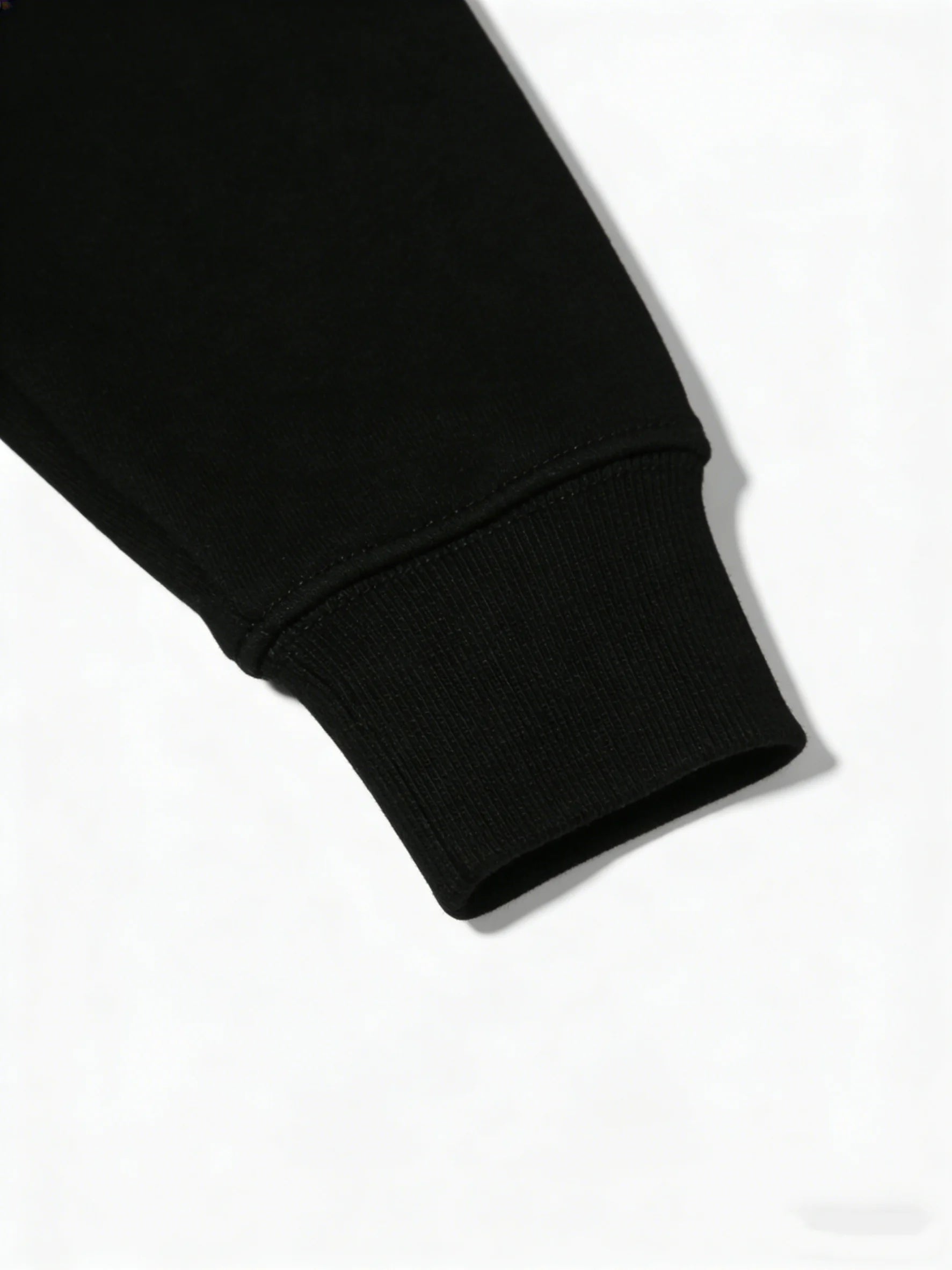 Close-up of a black sleeve on a white background