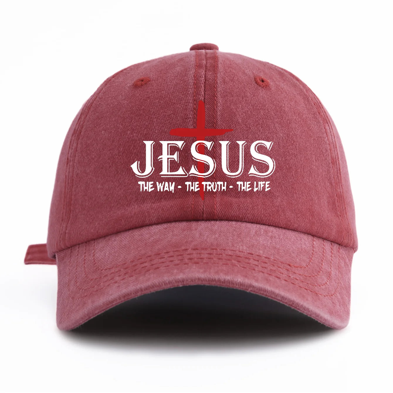 Red cap with 'Jesus The Way The Truth The Life' text on a white background