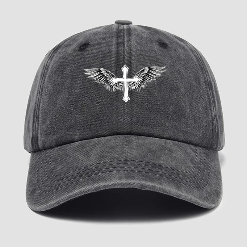 Gray cap with a cross and wings emblem on a light gray background