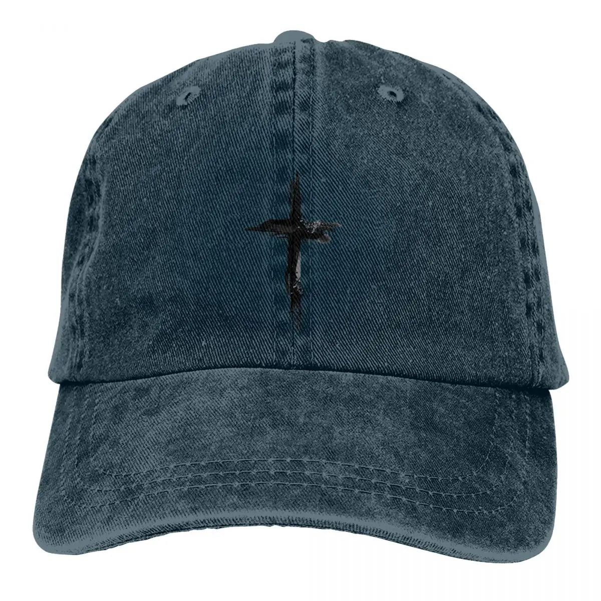 Blue denim cap with a black cross design on a white background
