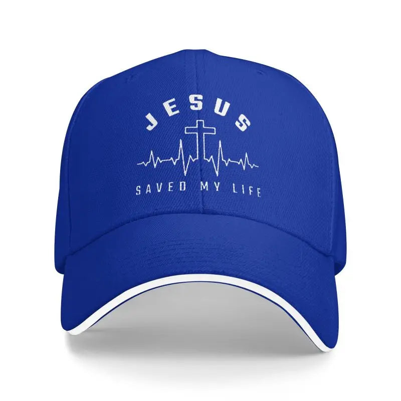 Blue cap with 'Jesus Saved My Life' text and cross design on a white background