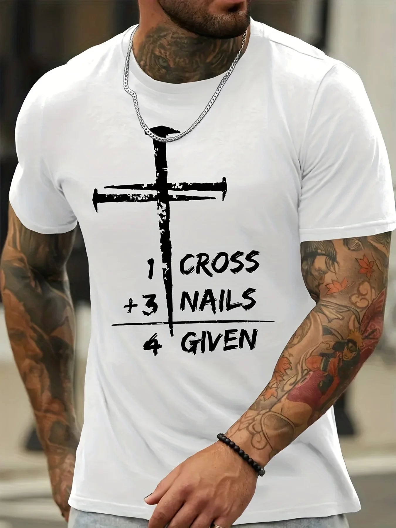 Man wearing white shirt with Religious symbols 