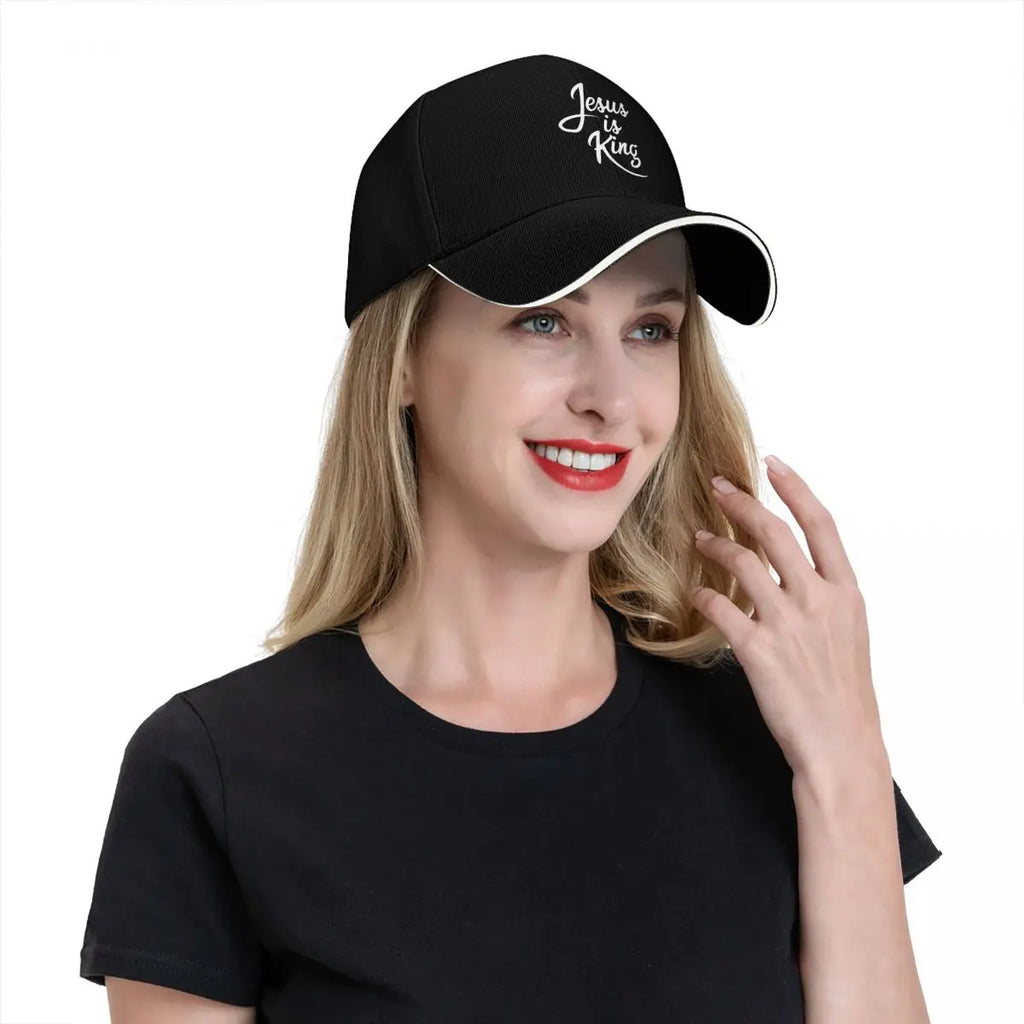 Woman wearing a black cap with branding on a white background
