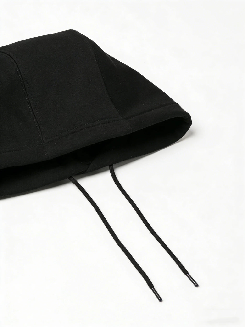 Black hoodie with drawstrings on a white background
