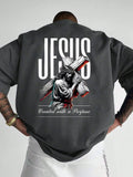 Person wearing a dark gray shirt with a graphic of Jesus carrying a cross and text on the back.