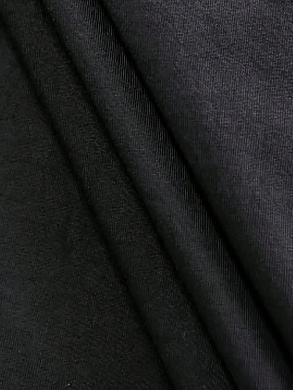 Close-up of dark gray fabric with visible texture