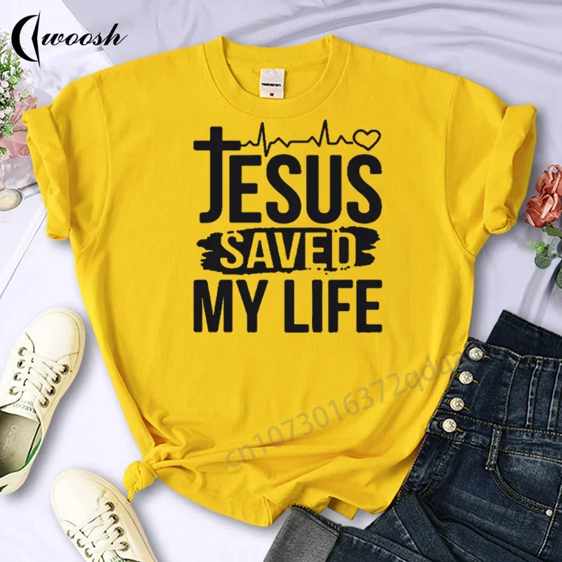 Yellow t-shirt with 'Jesus Saved My Life' text on a white background