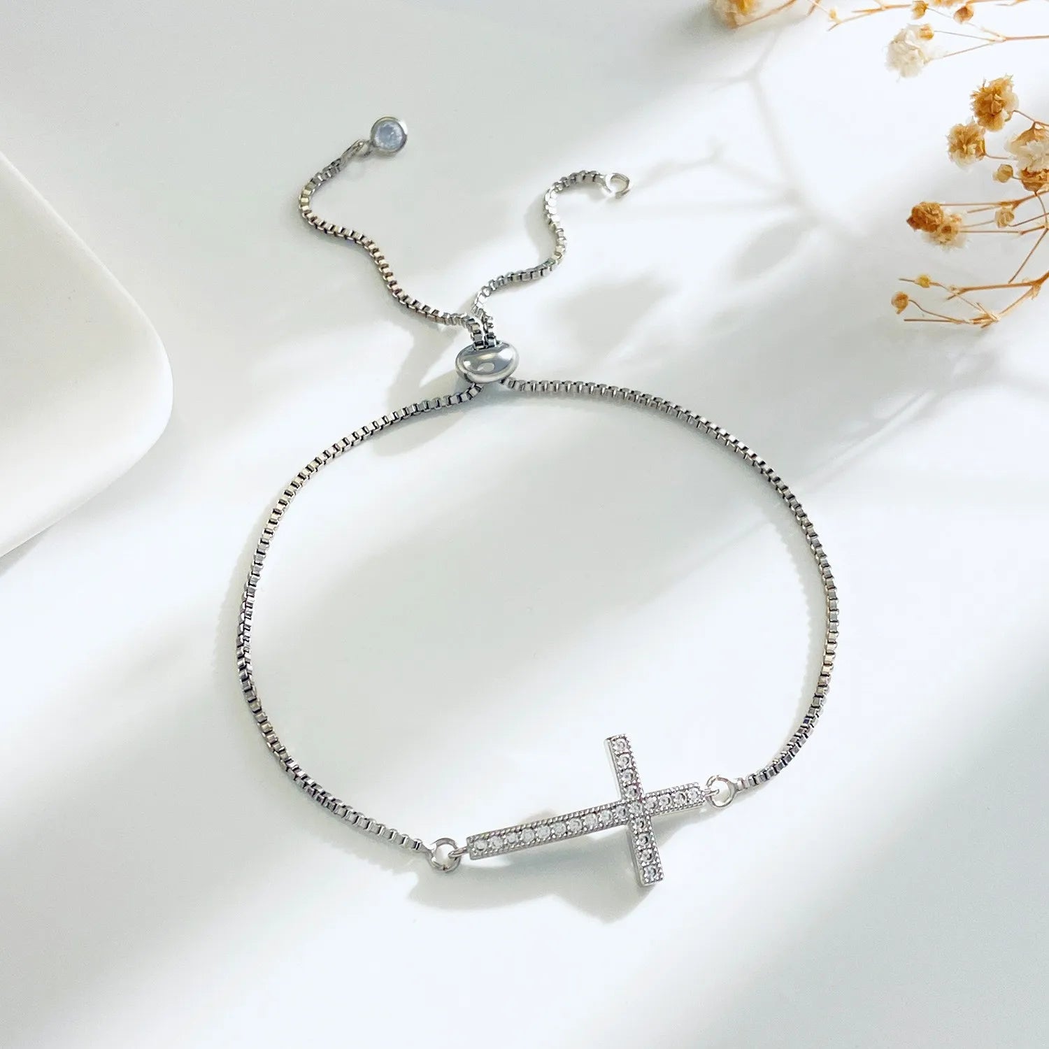 Zircon Cross Bracelet in silver Color A featuring a cross design.