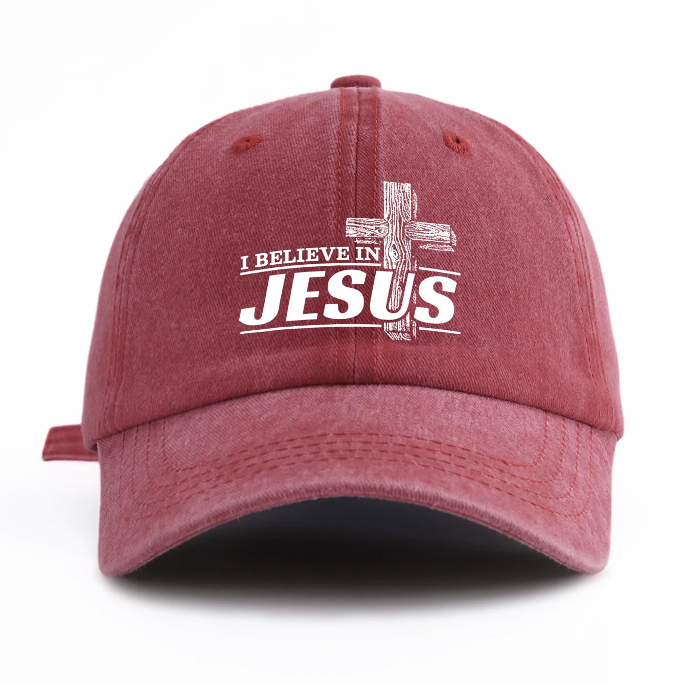 Red cap with 'I Believe in Jesus' text on a white background