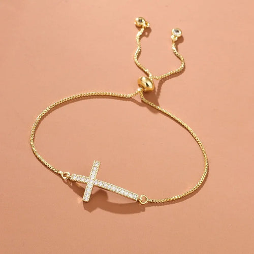 Zircon Cross Bracelet in gold Color A with a stylish look.
