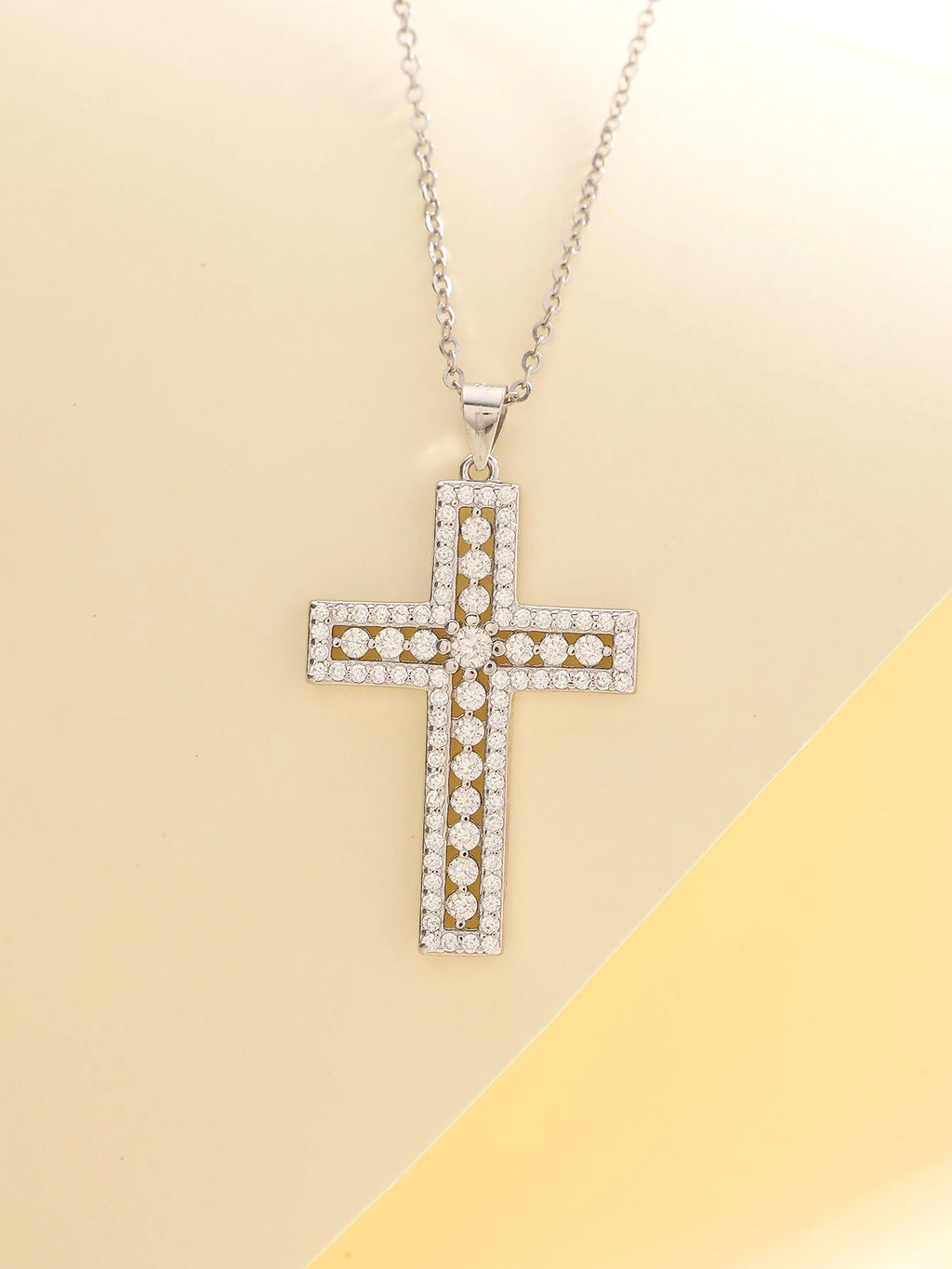 Moissanite Cross Necklace with a shimmering finish.