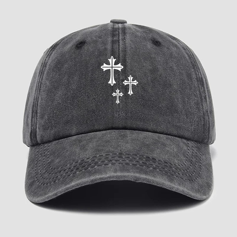 Gray cap with white cross designs on a light gray background