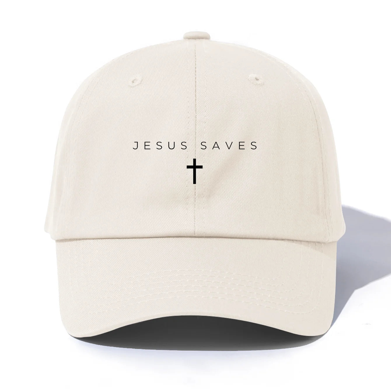 Beige cap with 'Jesus Saves' text and cross on a white background