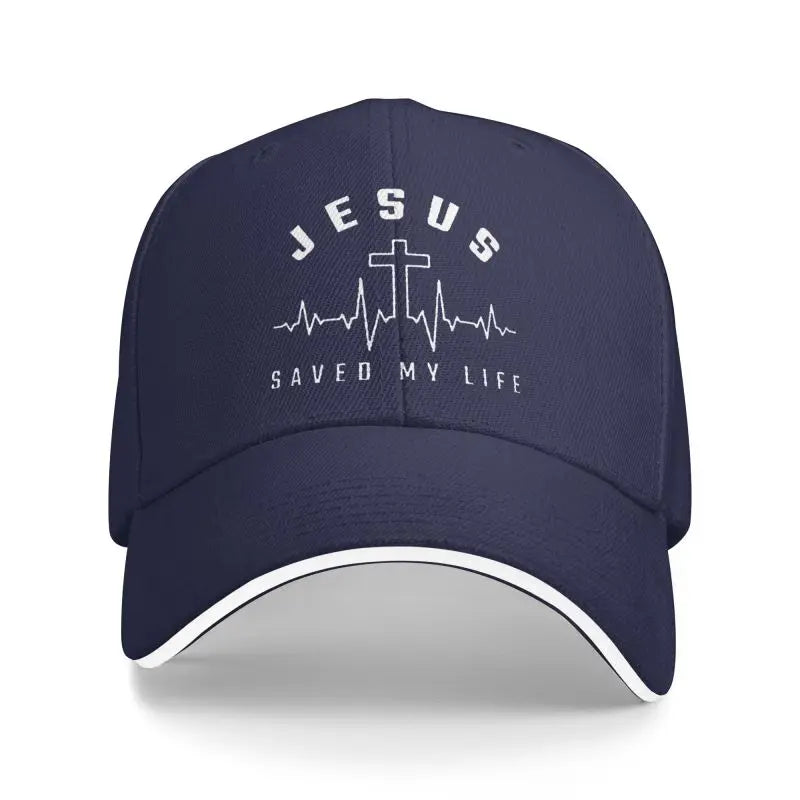 Navy blue cap with 'Jesus Saved My Life' text and cross design on a white background