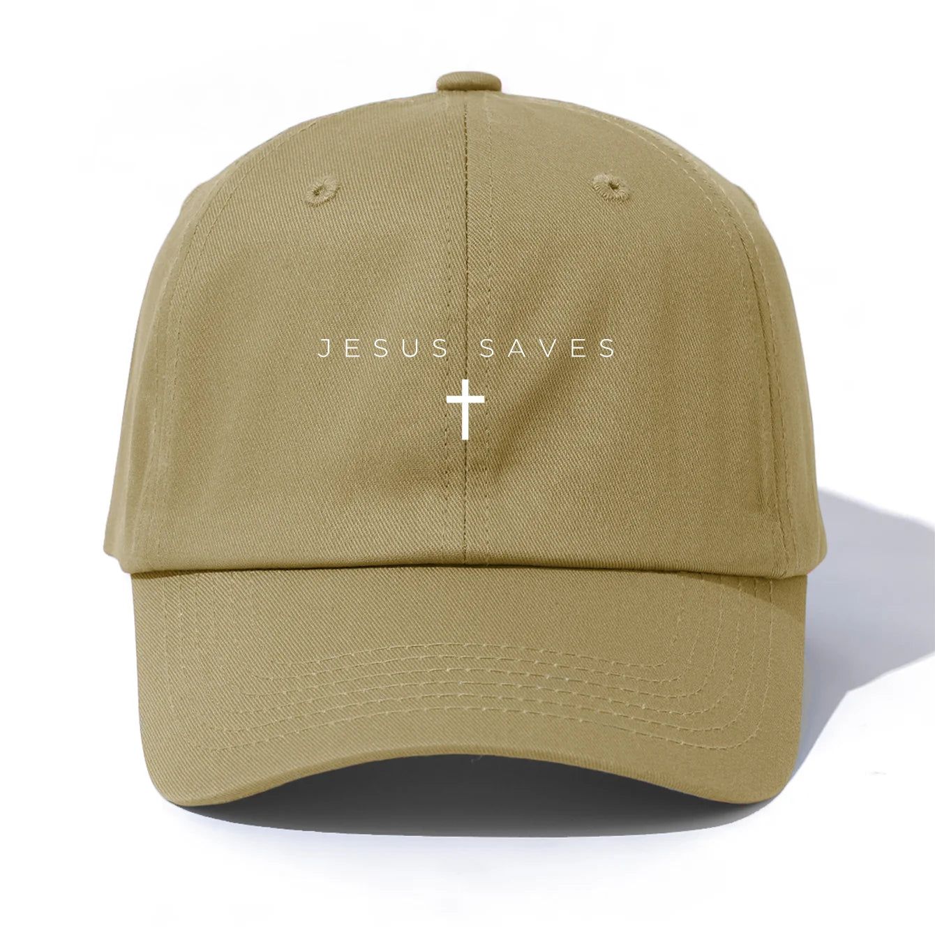 Khaki cap with 'Jesus is King' text on a white background
