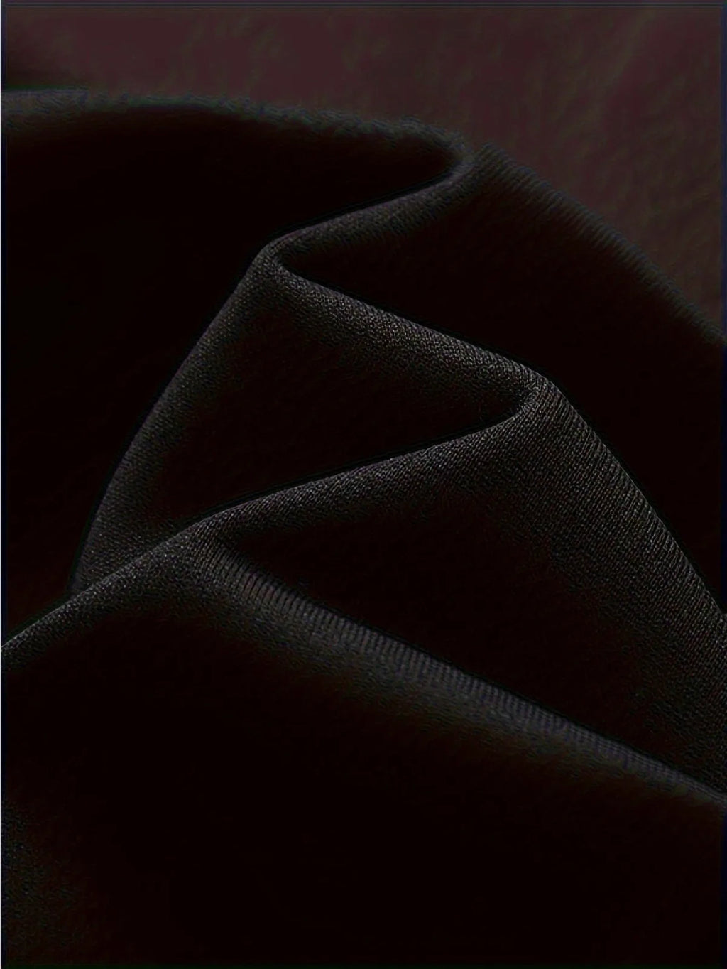 Close-up of dark fabric texture
