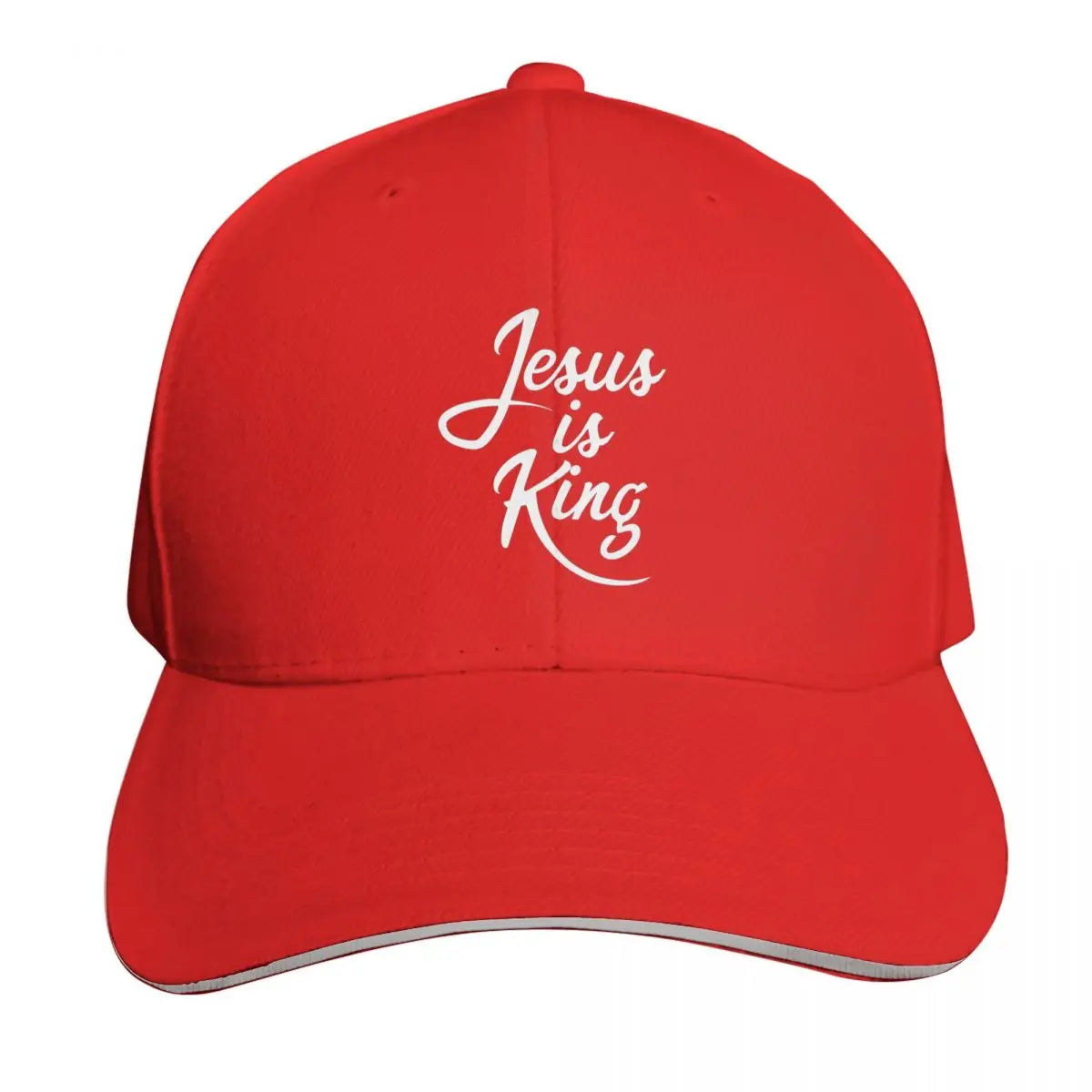 Red cap with 'Jesus is King' text on a white background