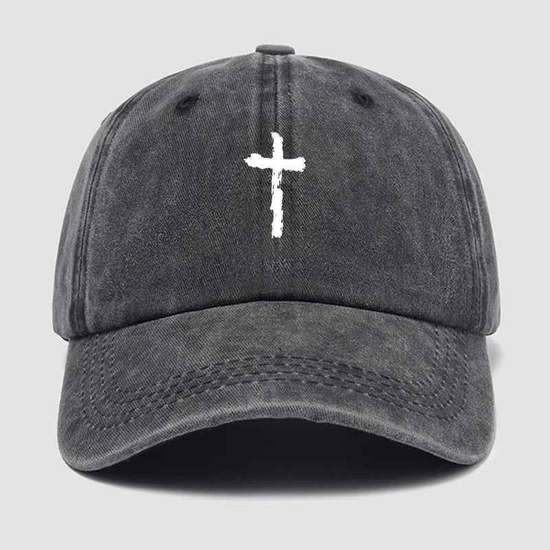Gray cap with a white cross emblem on a light gray background