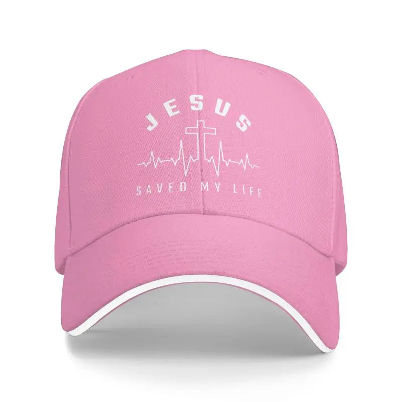Pink cap with 'Jesus Saved My Life' text and design on a white background