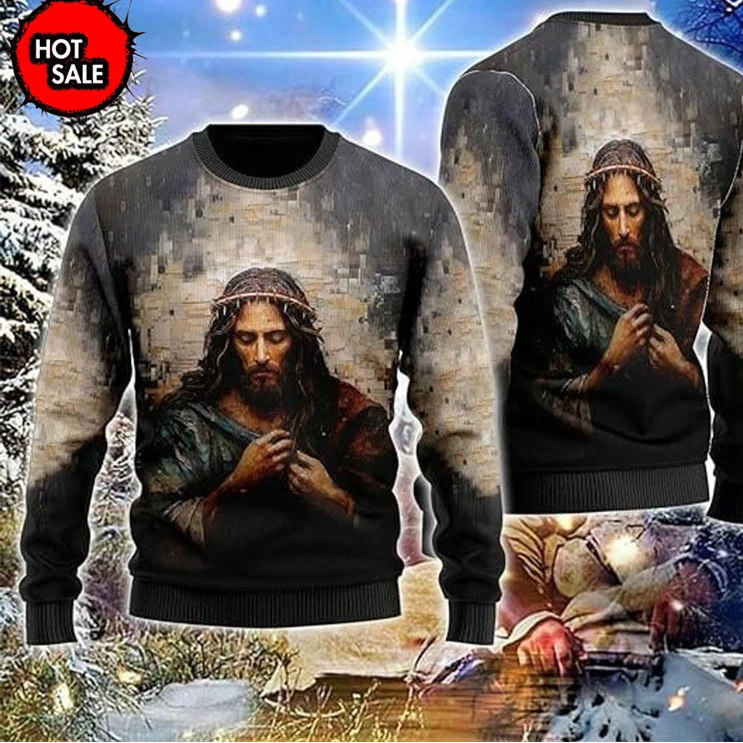 Sweater with a printed design of a religious figure, surrounded by decorative elements and text.