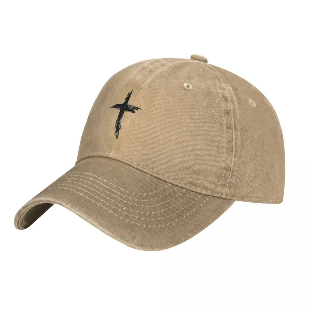 Beige cap with black cross design on a white background